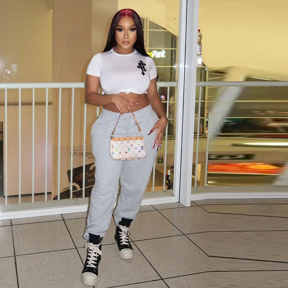 Women White Crop Top T-Shirt with Black Graphic High Heel Pants - Image 3