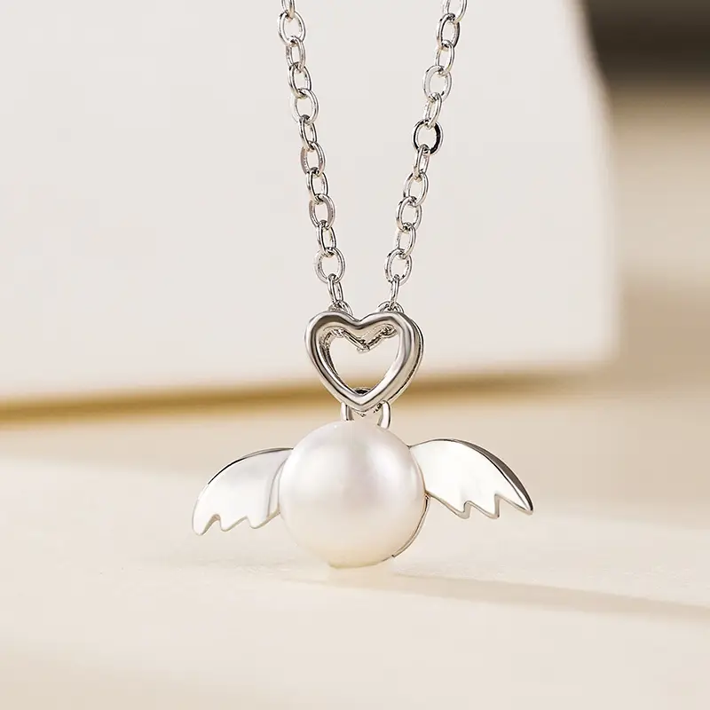 Gold Heart Angel Pearl Pendant Necklace - Image 4