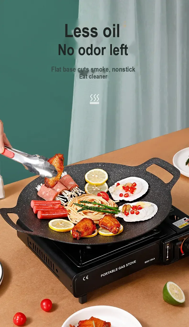 Food cooking on the pan as it is handled with kitchen tongs; Chinese text discusses reduced oil and smoke.