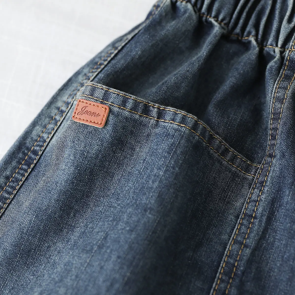 Women Denim Shorts with Large Pockets & Elastic Waist - Image 3