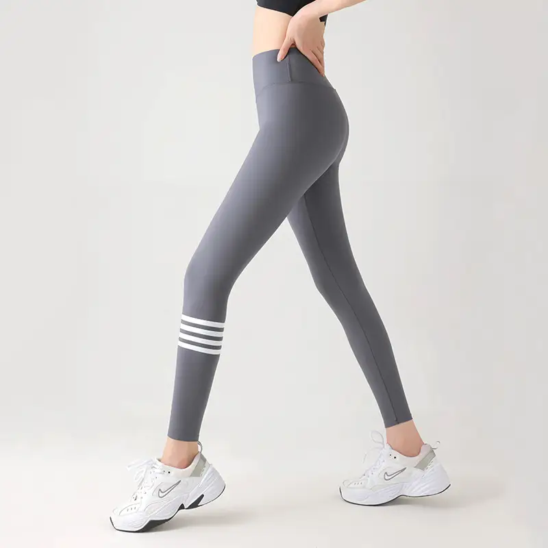 Black Printed Leggings with 4-Stripe Design for Women - Image 4