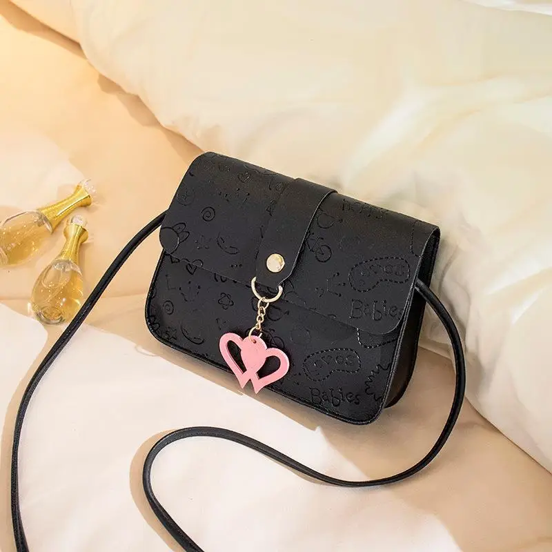 Pink Embossed Ladies Shoulder Bag with Heart Pendant - Image 3