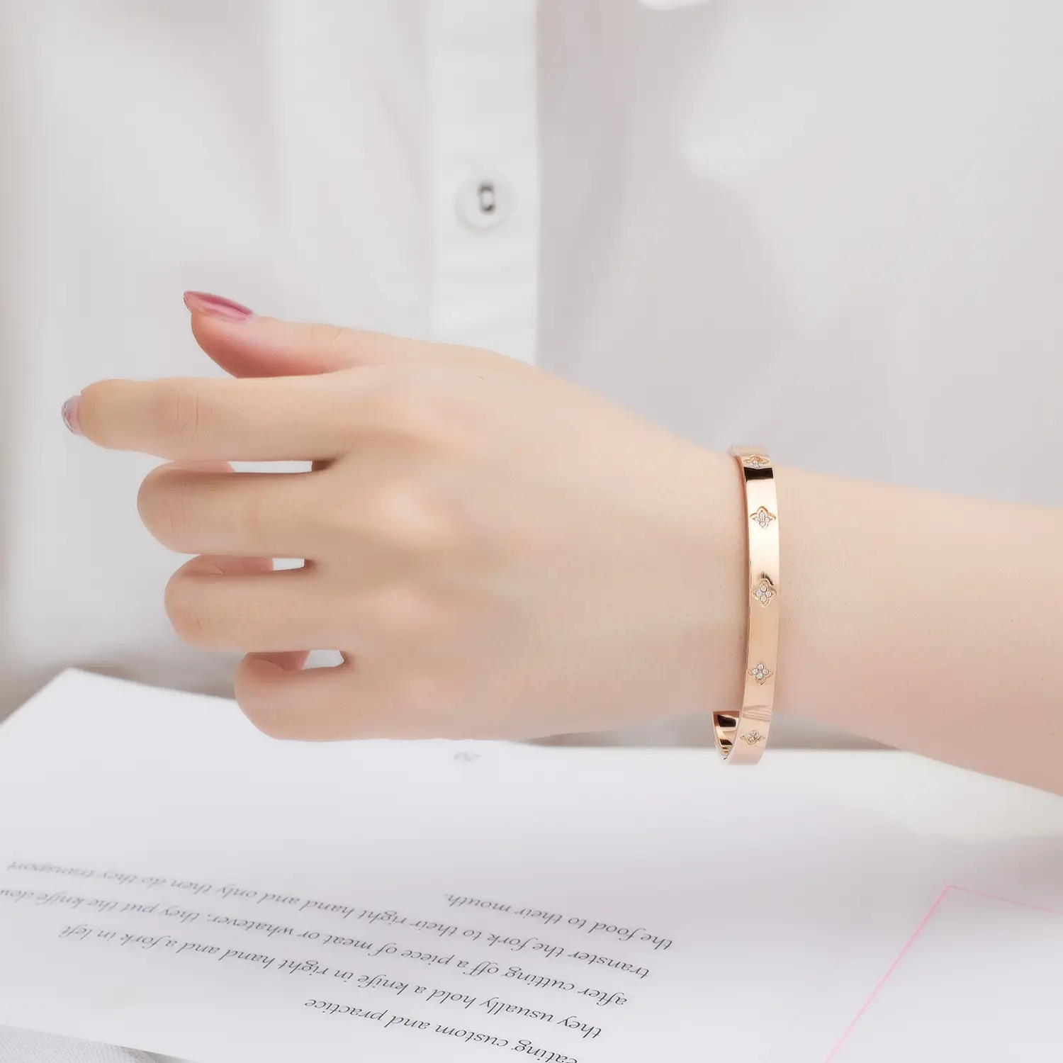 Shiny Four-Leaf Flower Stainless Steel Bracelet with Plum Blossom Design