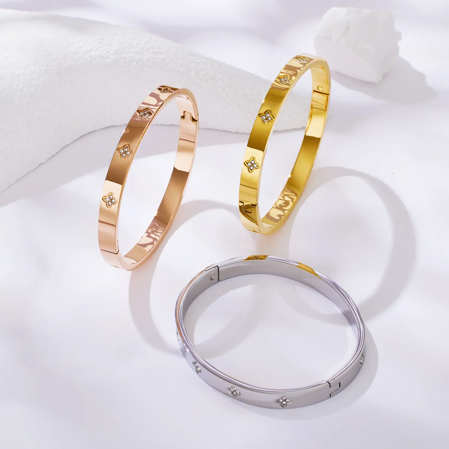 Shiny Four-Leaf Flower Stainless Steel Bracelet with Plum Blossom Design