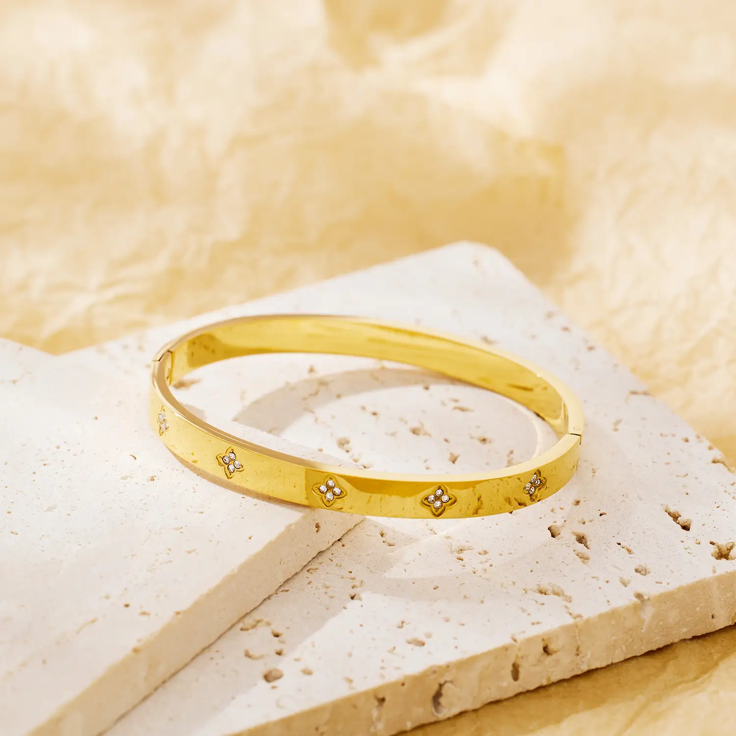 Shiny Four-Leaf Flower Stainless Steel Bracelet with Plum Blossom Design