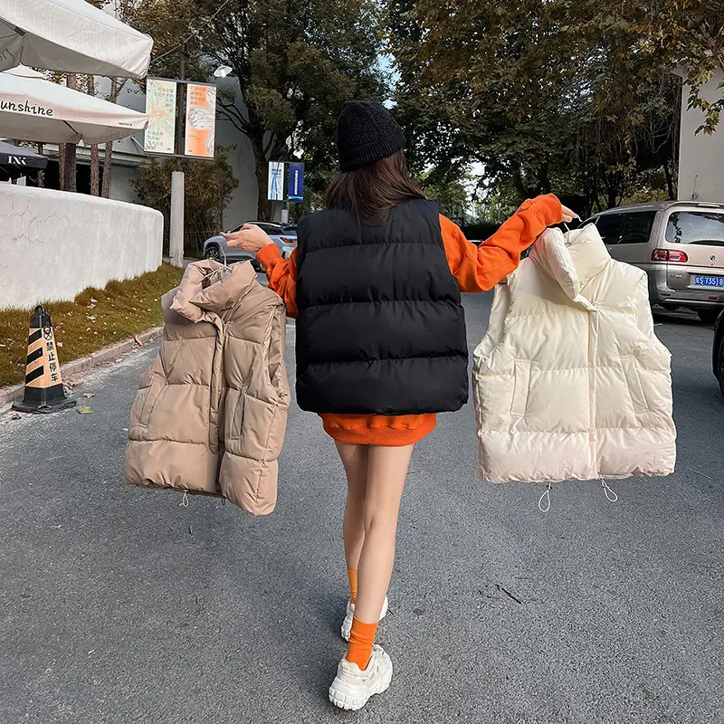Women's Black Puffer Vest with Orange Sleeves Large
