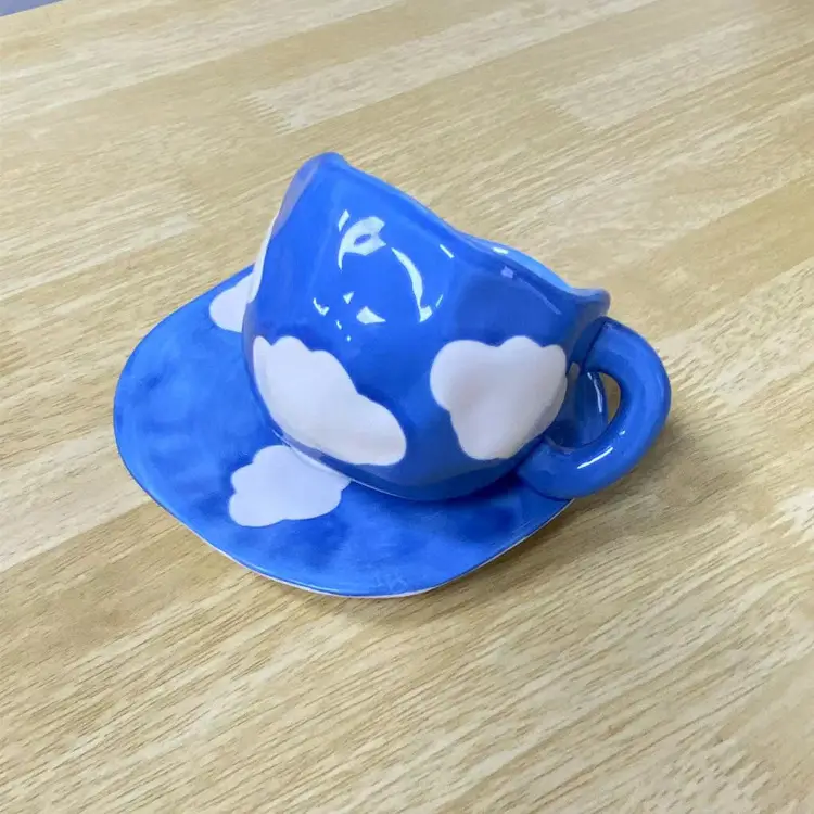 Blue sky and white clouds cup and saucer dark 300ml