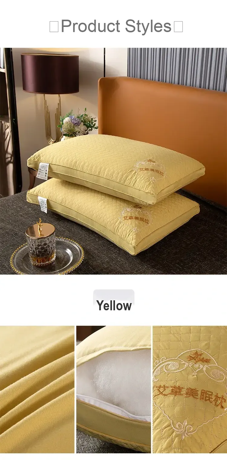 Yellow embroidered pillow pair shown with a color label.