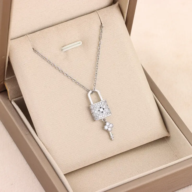 Gold Tassel Key Necklace with Diamonds for Women