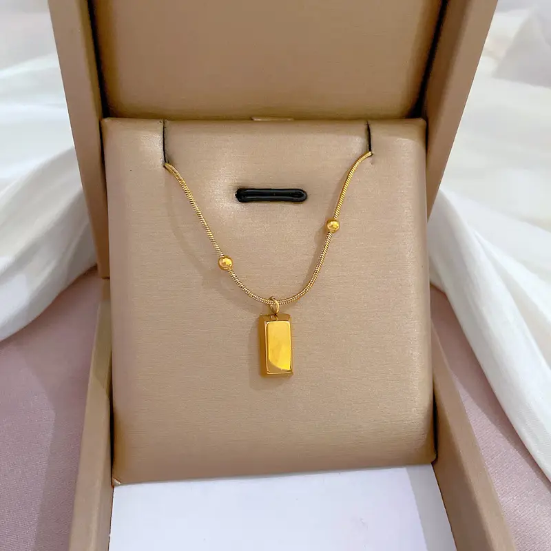 Gold Pendant Necklace with Black Circle Design - Image 18