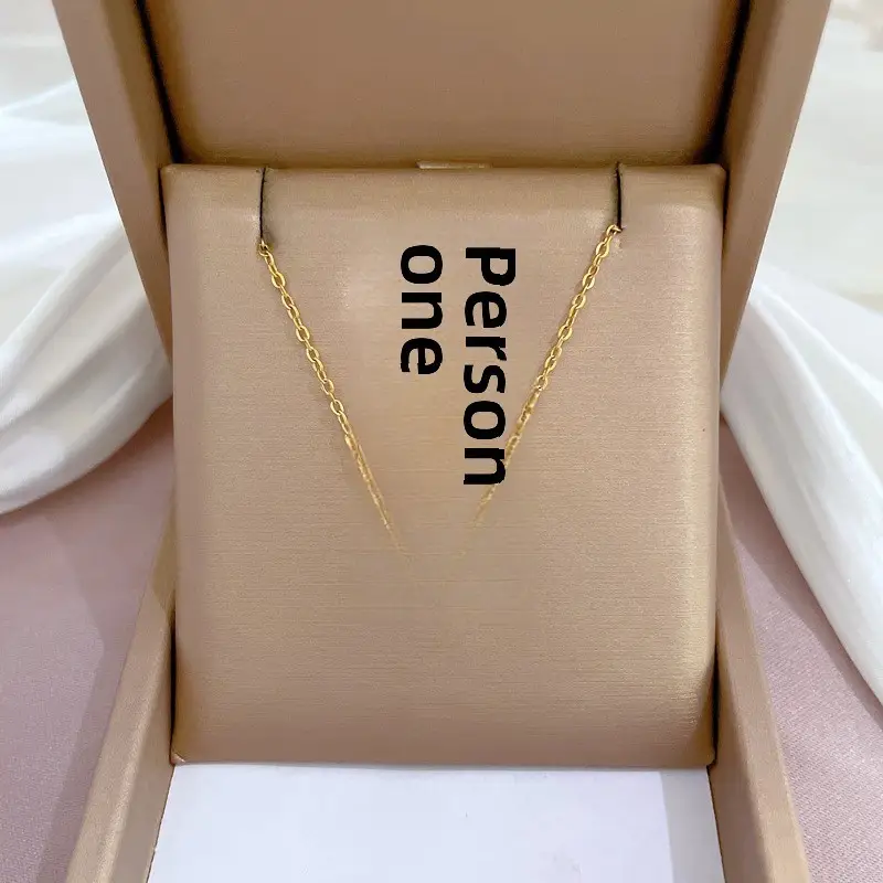 Gold Pendant Necklace with Black Circle Design - Image 2