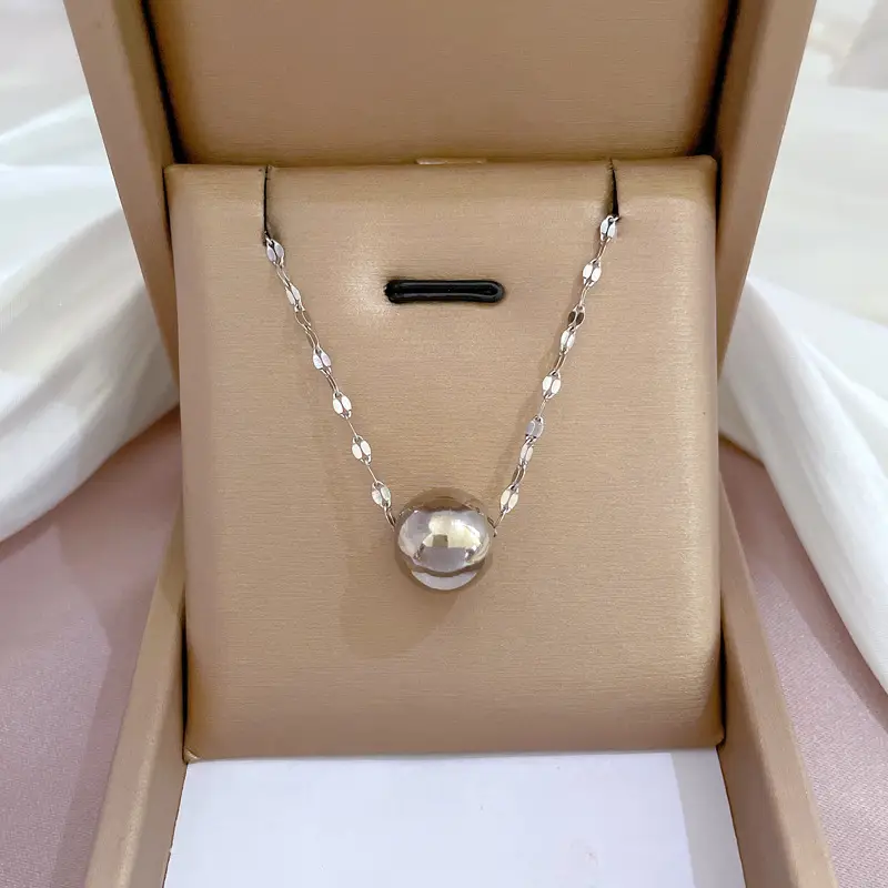 Gold Pendant Necklace with Black Circle Design - Image 22