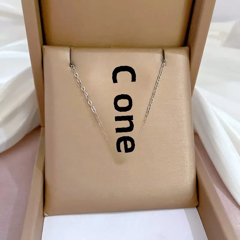 Gold Pendant Necklace with Black Circle Design - Image 31