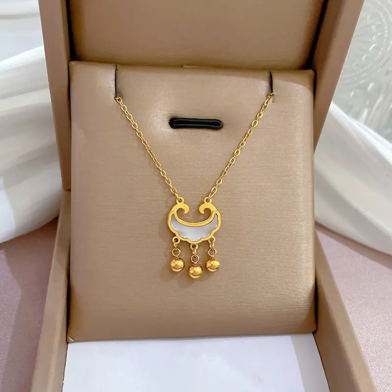 Gold Pendant Necklace with Black Circle Design - Image 39