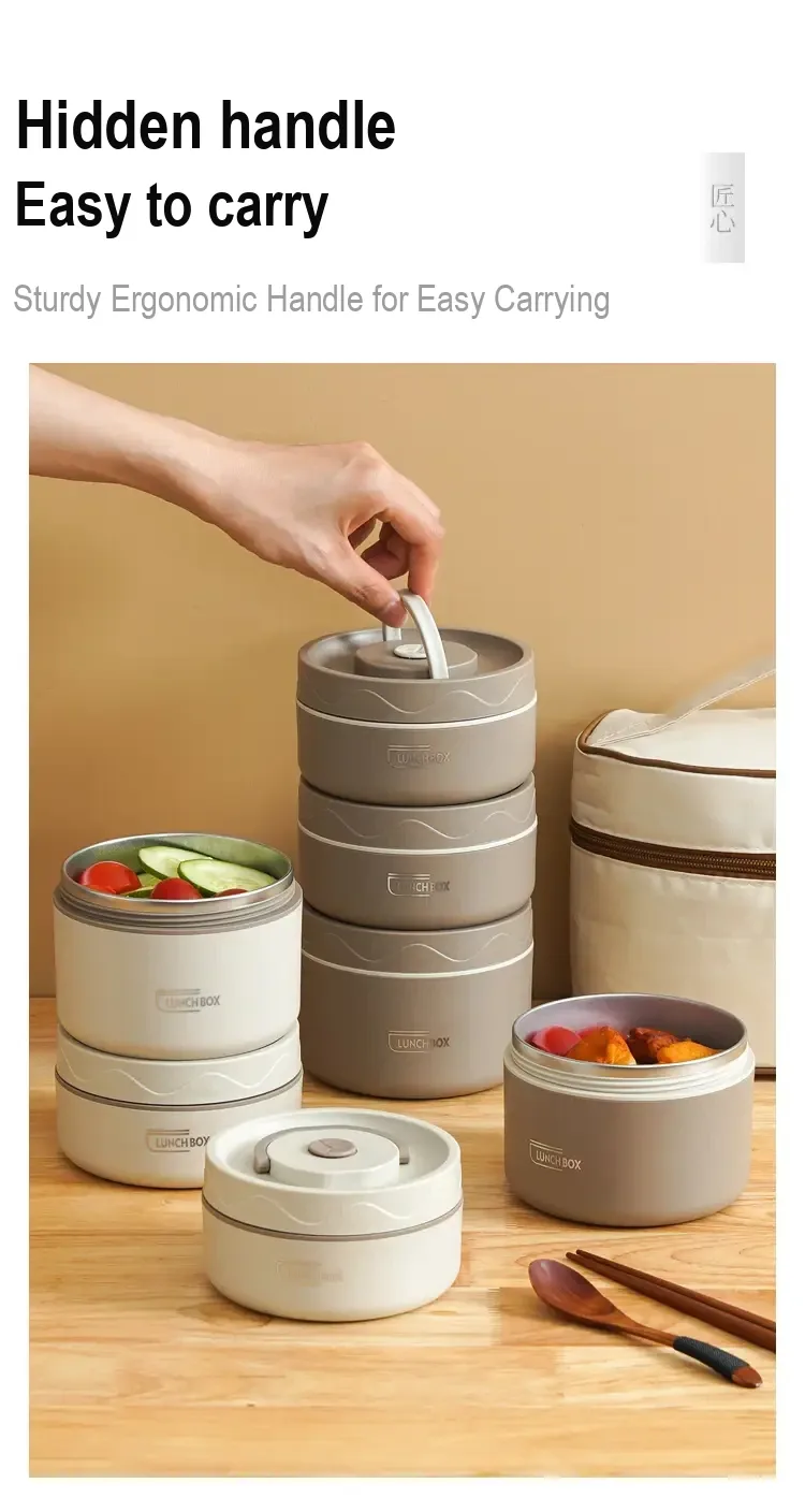 Stacked lunch containers with a raised lid handle beside the insulated bag.
