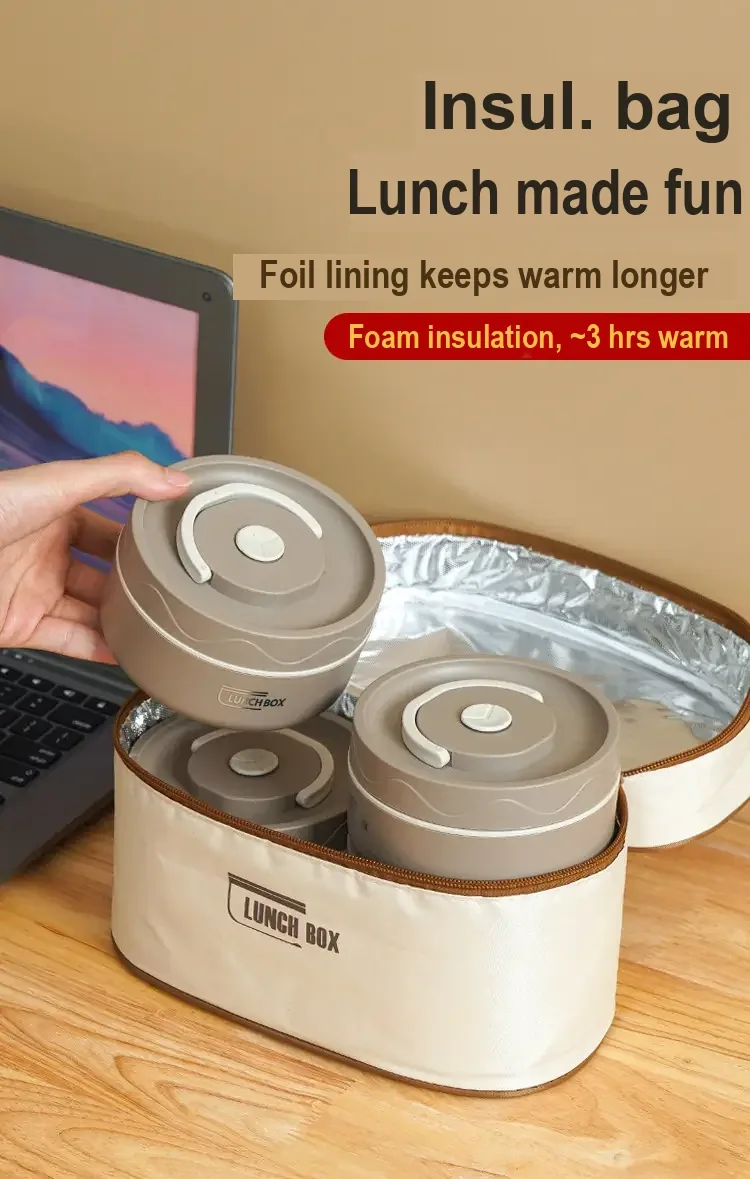 Lunch containers placed inside an open insulated carry bag with foil lining.