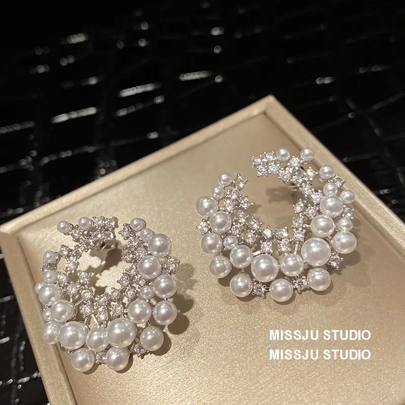 Pearl c hoop earrings