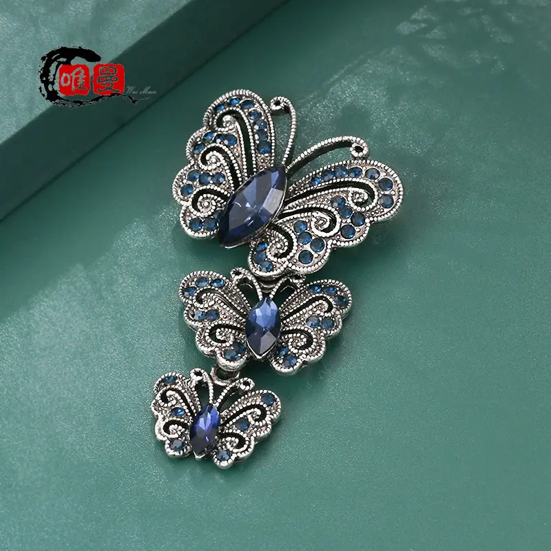 Vintage Silver Butterfly Brooch with Blue Crystal Diamonds - Image 5