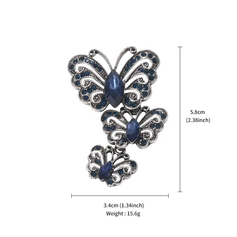 Vintage Silver Butterfly Brooch with Blue Crystal Diamonds - Image 7