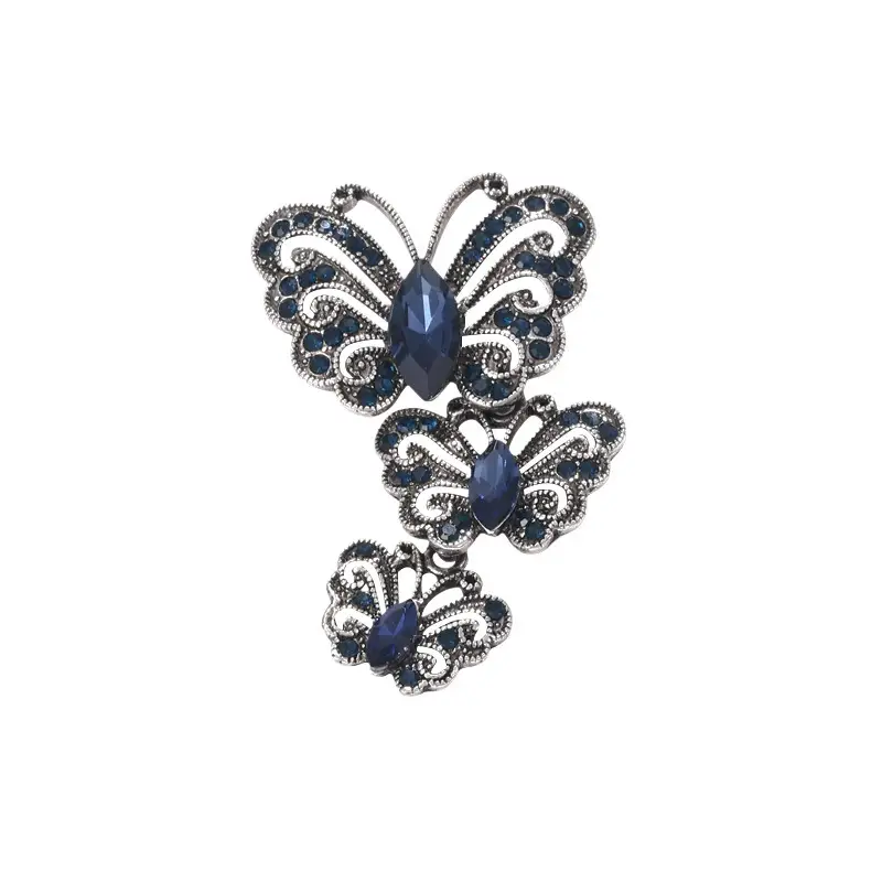 Vintage Silver Butterfly Brooch with Blue Crystal Diamonds - Image 8