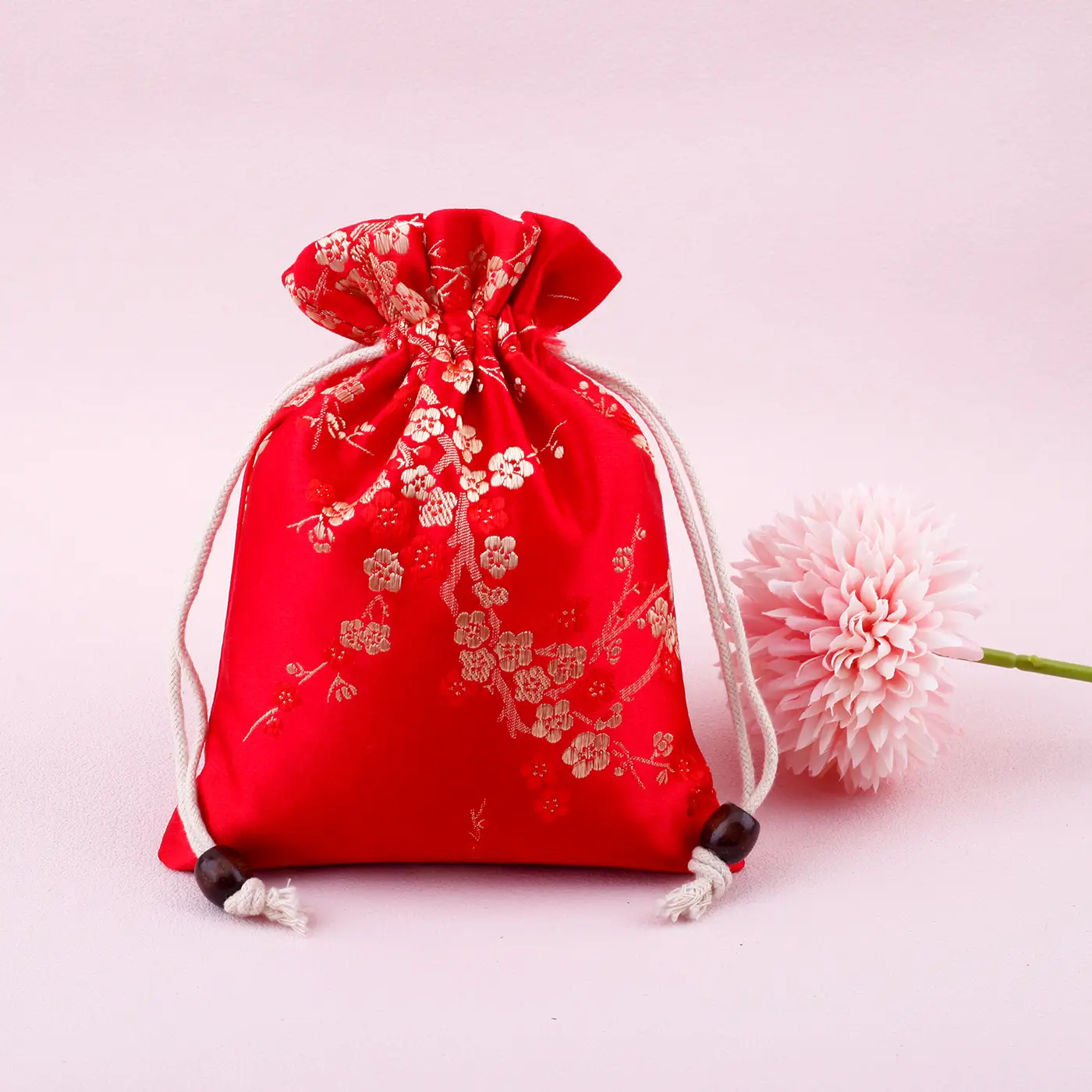 Red Drawstring Jewelry Bag with Embroidered Design - Image 2