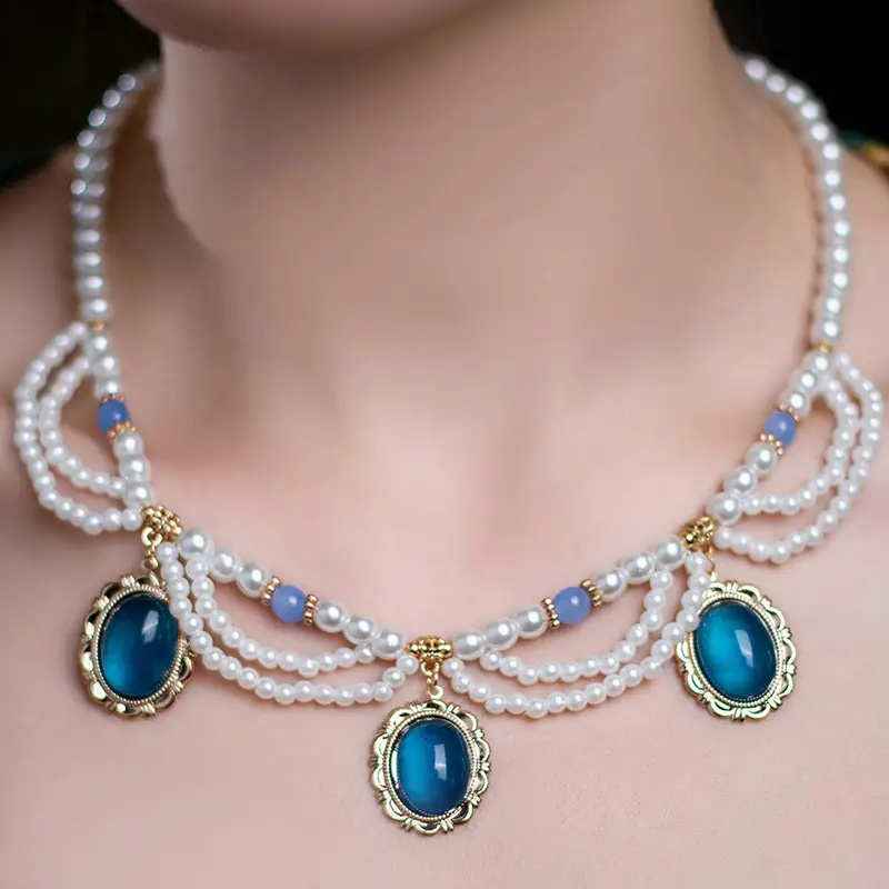 Multi-layer Pearl Necklace with Blue Gemstones - Image 3