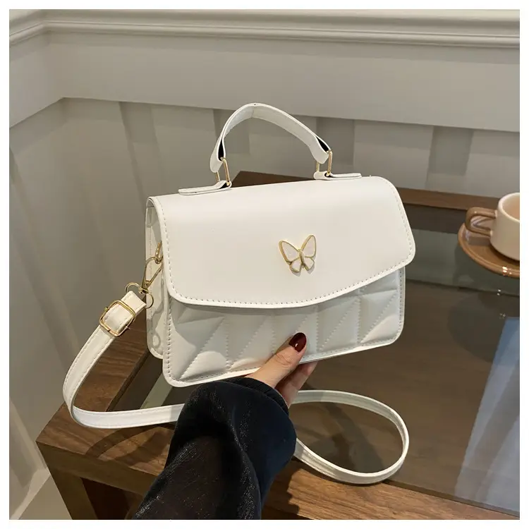 Women's Beige Quilted Shoulder Bag with Butterfly Charm - Image 2