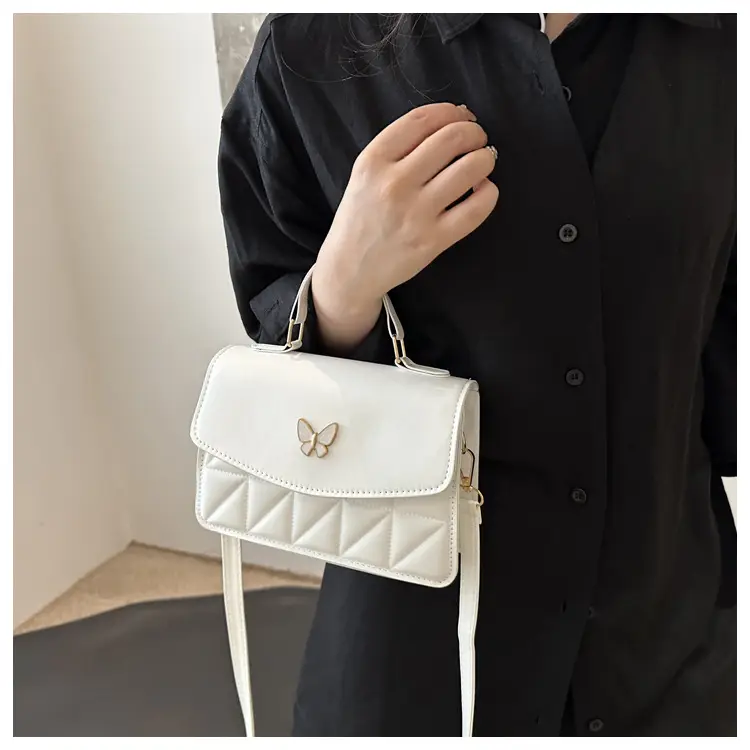 Women's Beige Quilted Shoulder Bag with Butterfly Charm — feature 10