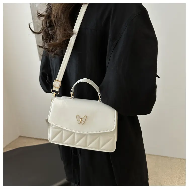 Women's Beige Quilted Shoulder Bag with Butterfly Charm — feature 11