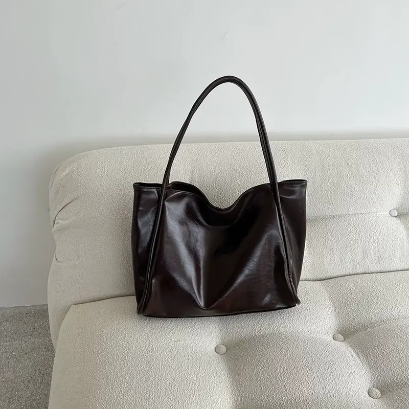 Women's Black Textured Tote Bag with Niche Design — feature 13
