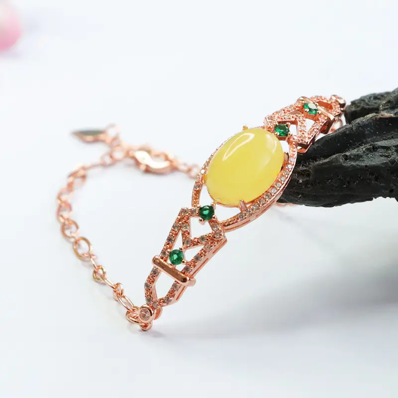 Guan Yu Natural Honey Amber Bracelet with Green Accents — feature 10