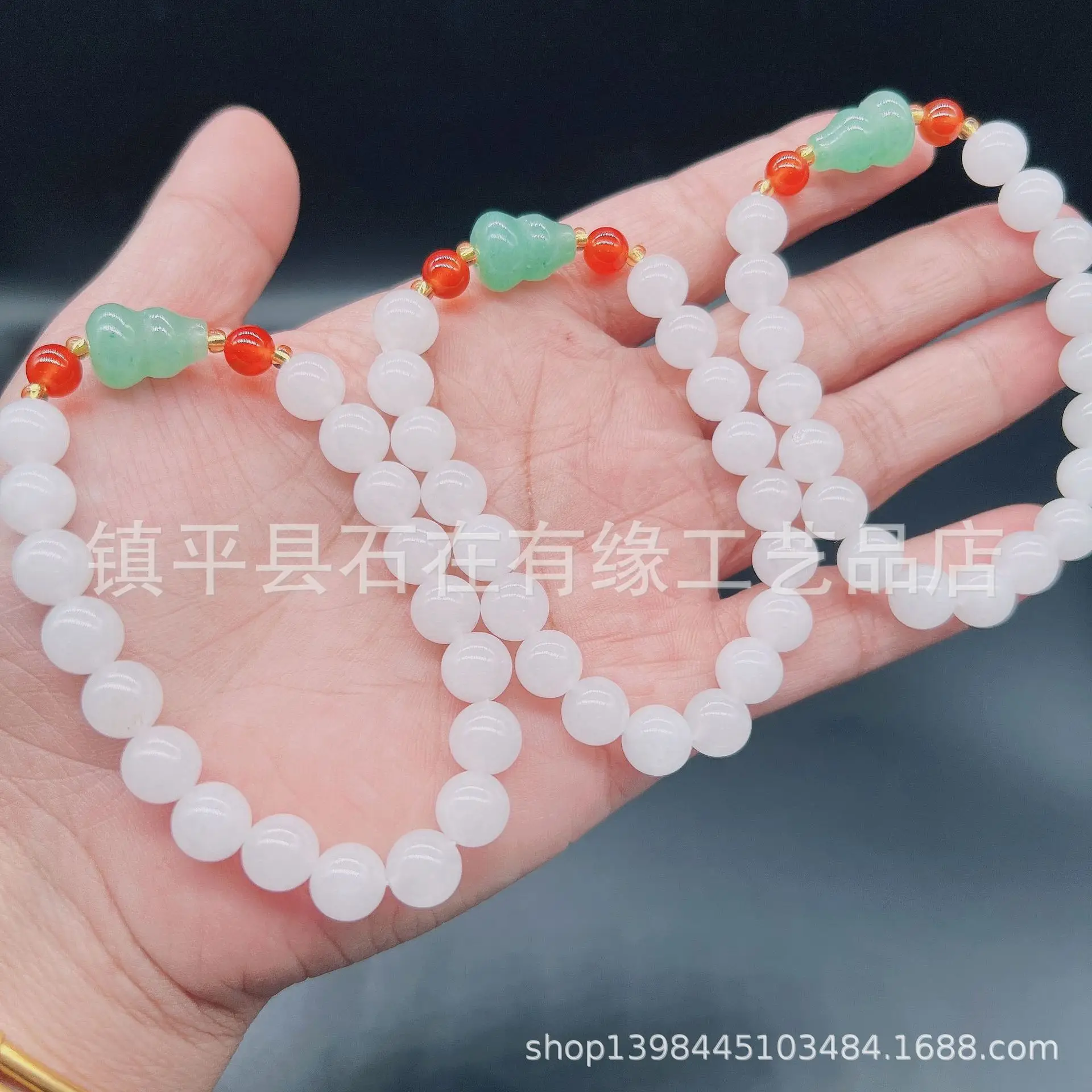 Xinjiang Golden Silk White Jade Round Bead Bracelet — feature 4