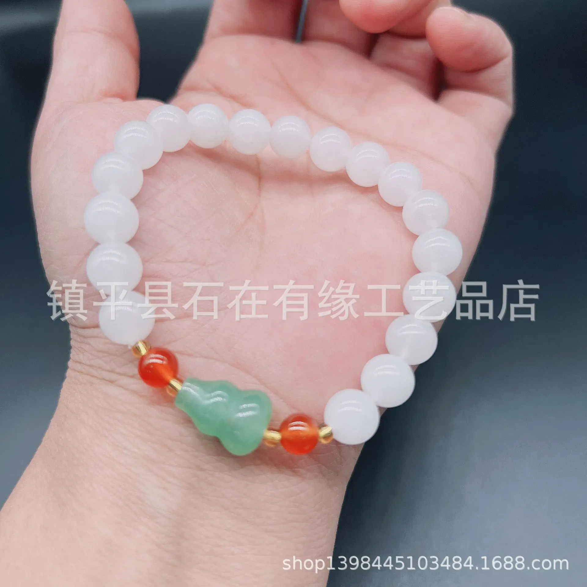 Xinjiang Golden Silk White Jade Round Bead Bracelet — feature 6