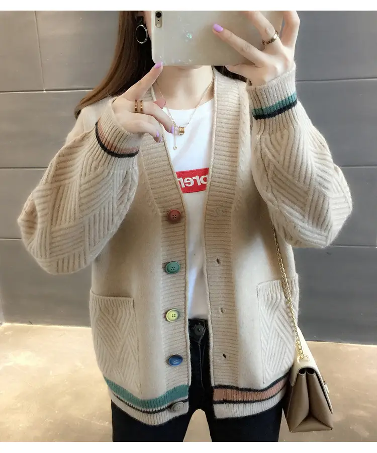 Front view of a light beige cardigan with contrast trim and multicoloured buttons.