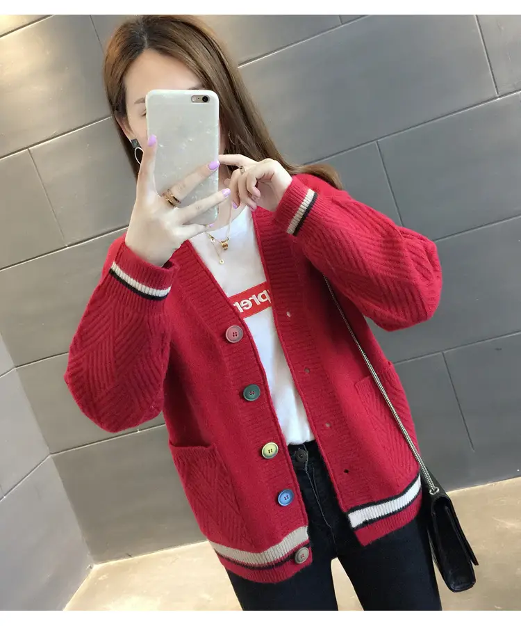 Model wearing the red cardigan, shown from the front.