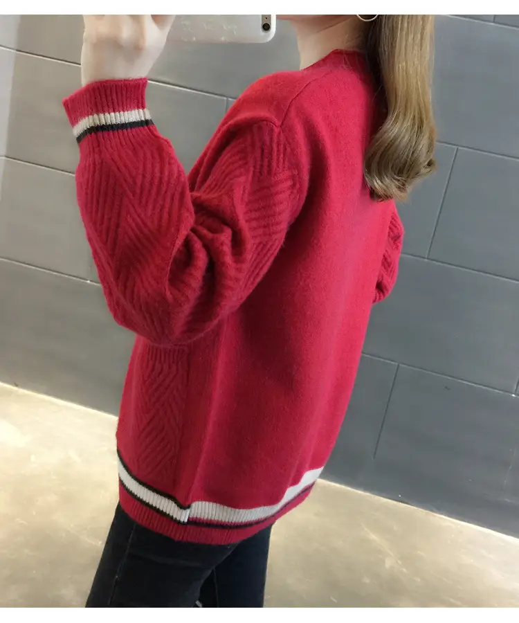 Back view of the red cardigan with striped ribbed hem and cuffs.