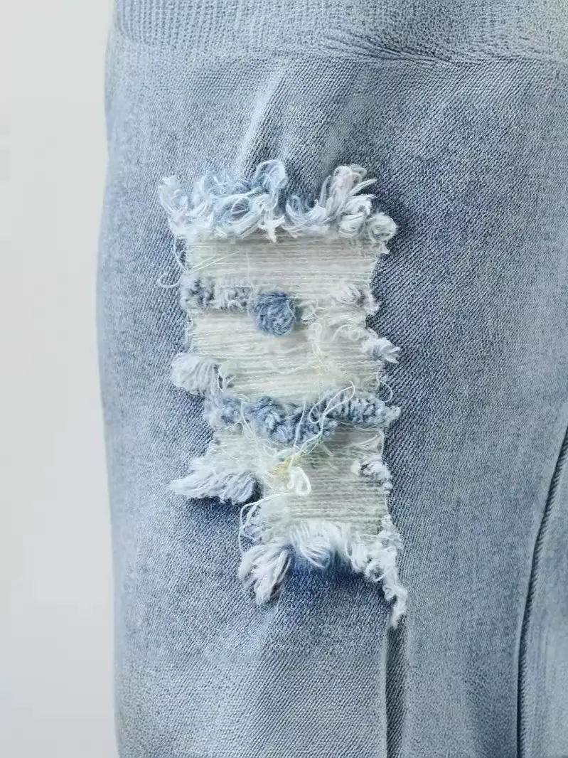 Washed Light Blue Jeans for Men with Holes & White Sneakers - Image 4