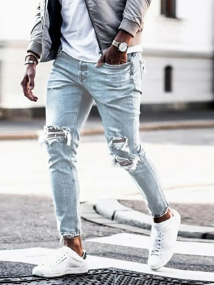 Washed Light Blue Jeans for Men with Holes & White Sneakers - Image 5