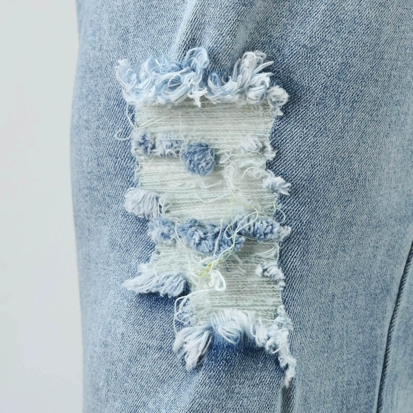 Washed Light Blue Jeans for Men with Holes & White Sneakers — feature 8