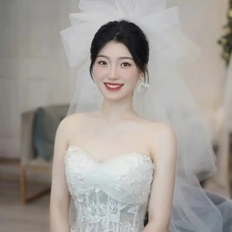 White Puffy Cloud Bubble Wedding Veil with Makeup - Image 5