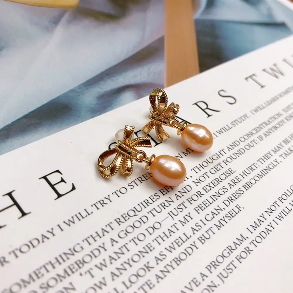Pearl Earrings with Bow Design for Women - Image 2