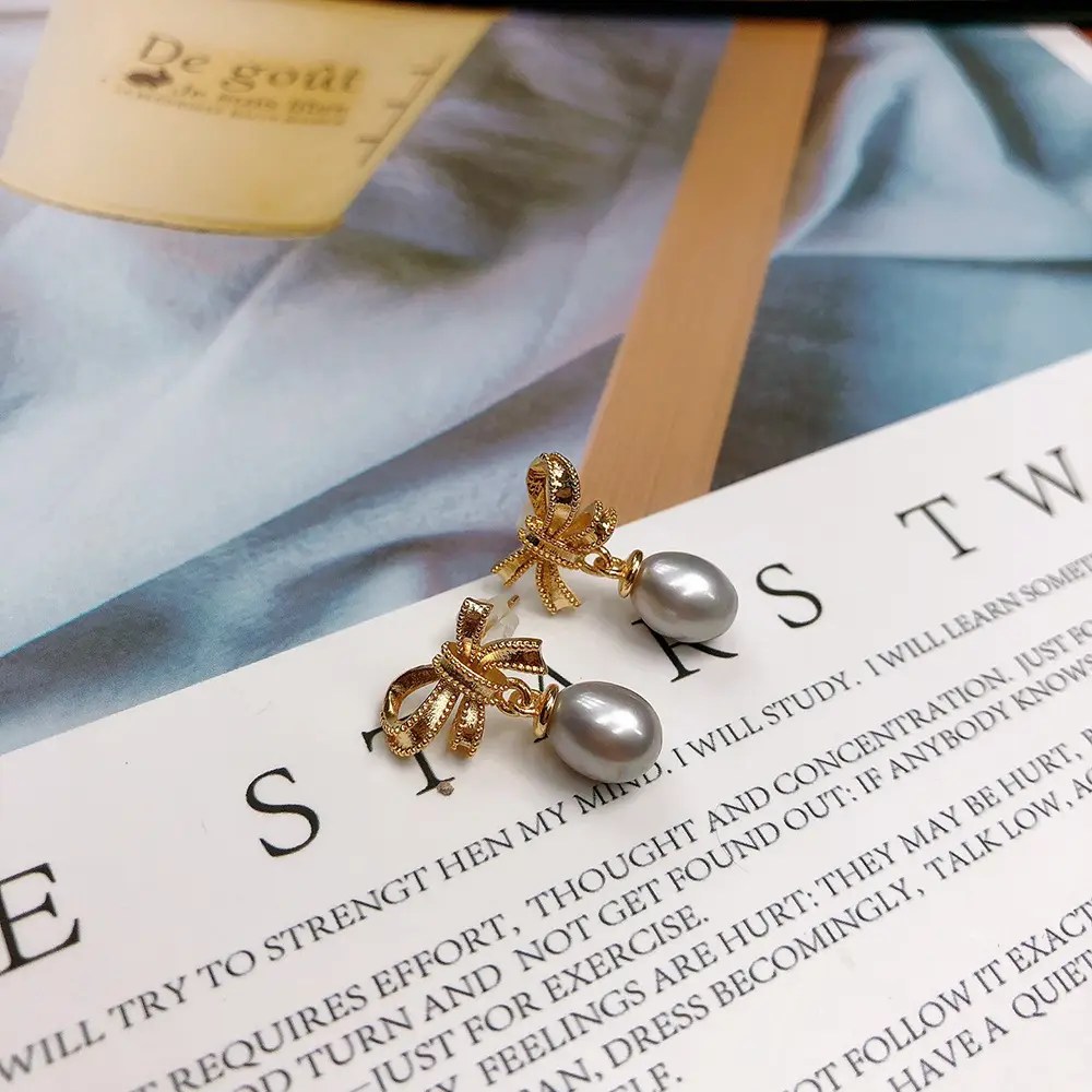 Pearl Earrings with Bow Design for Women - Image 5