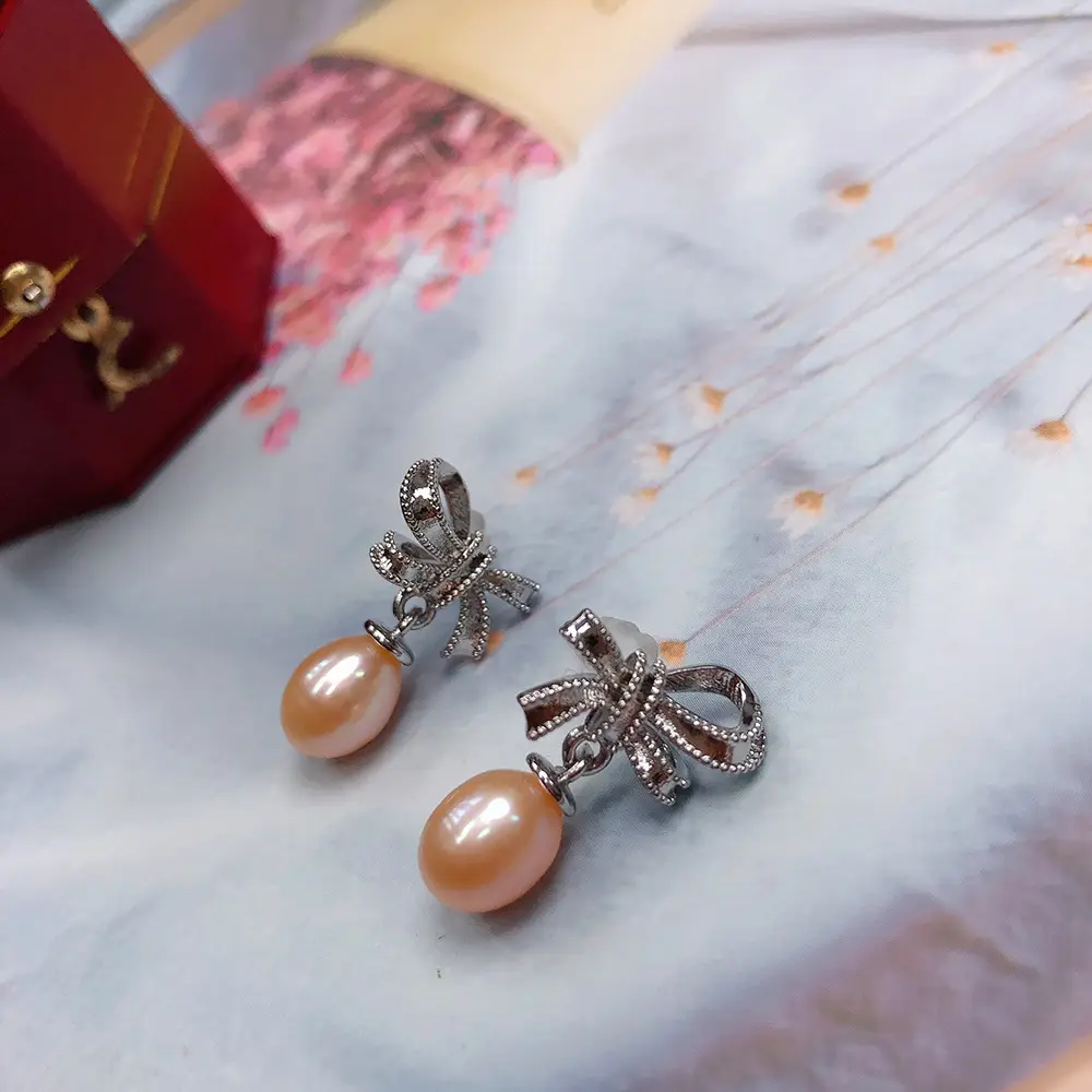Pearl Earrings with Bow Design for Women - Image 8