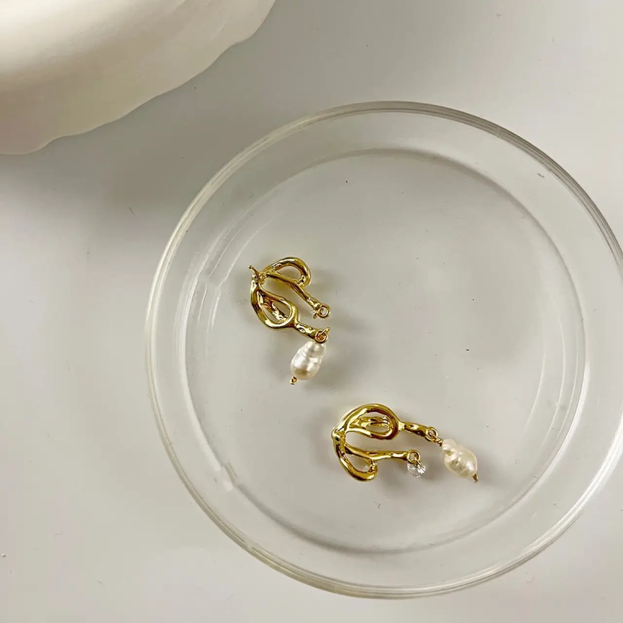 Abstract Melted Bow Pearl Earrings Silver Pin — feature 6