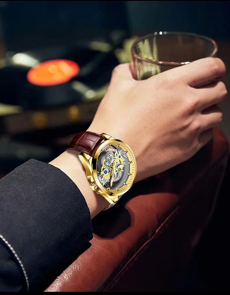 Gold Mechanical Watch with Transparent Face & Luminous Hands — feature 11
