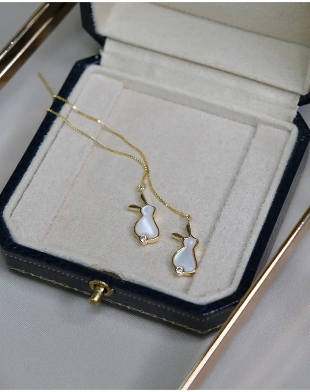 Cute Rabbit Earrings Gold Plated White Shell Long Earrings — feature 9