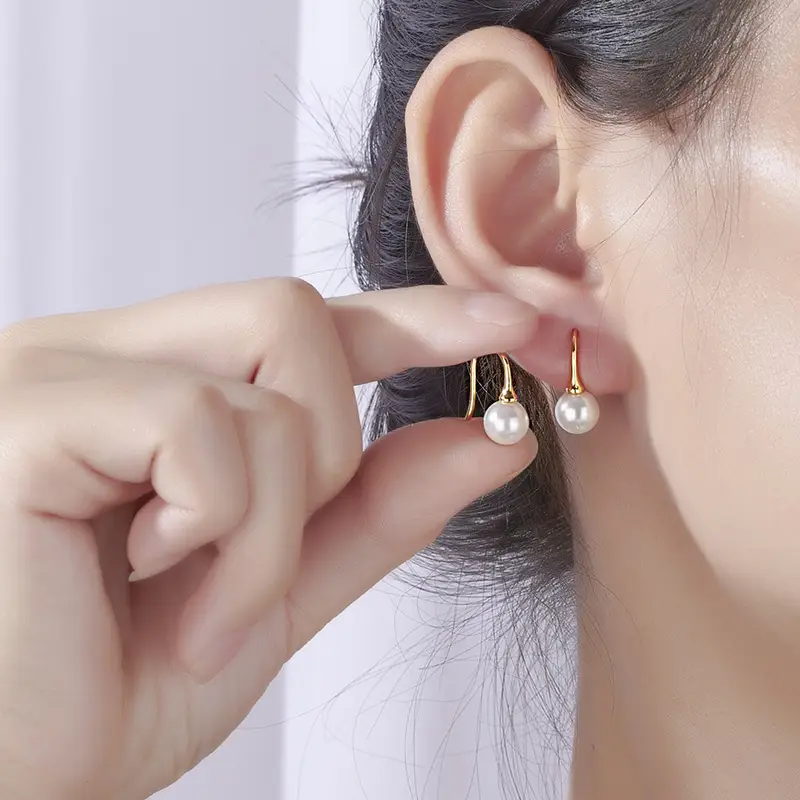 Women's Pearl Drop Earrings with Star Design