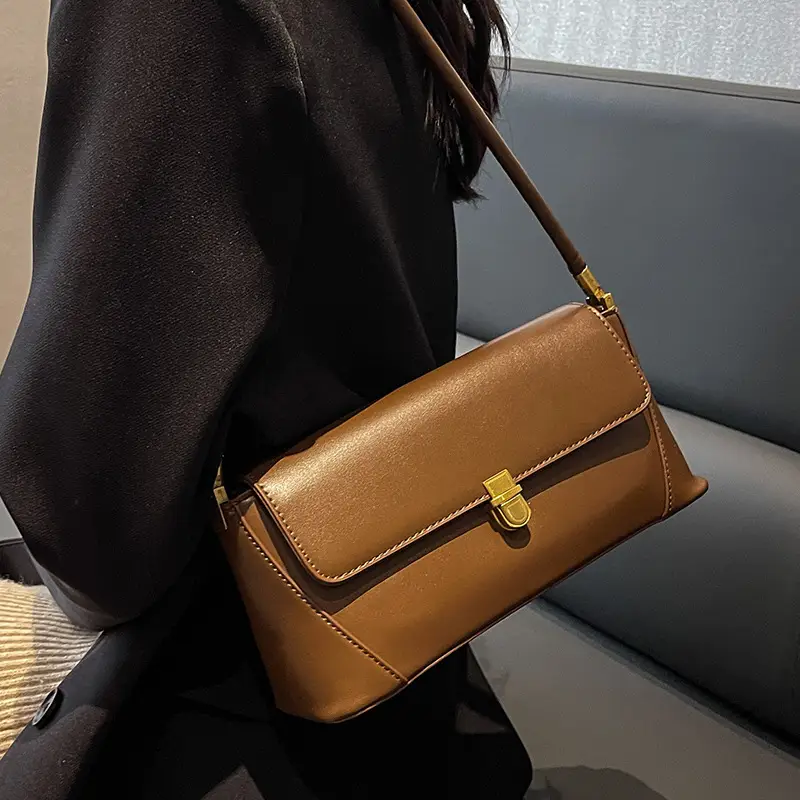 Black Leather Shoulder Bag with Gold Plated Latches - Image 6