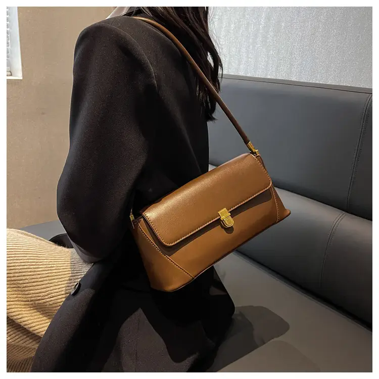 Black Leather Shoulder Bag with Gold Plated Latches — feature 22