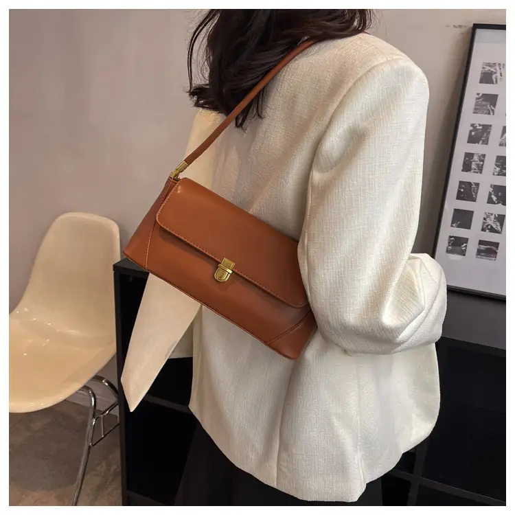 Black Leather Shoulder Bag with Gold Plated Latches — feature 34